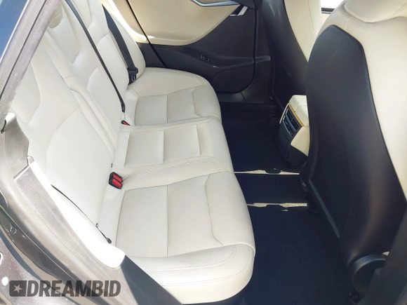 2020 Tesla Model S Long Range with VIN 5YJSA1E24LF415849, listed as a IAAI auction lot 42571945 with 34,398 mi miles and . Bid and sale history available at DreamBid. Image 8.