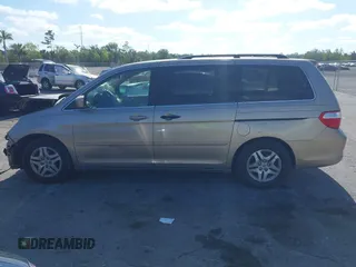 2005 Honda Odyssey EX with VIN 5FNRL38495B401742, listed as a IAAI auction lot 42133434 with 162,161 mi miles and . Bid and sale history available at carsss.com. Image 15.