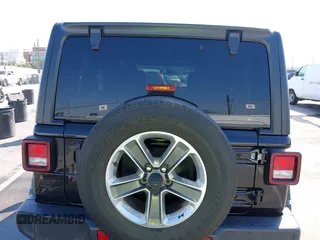 2020 Jeep Wrangler Unlimited Sahara with VIN 1C4HJXEN7LW230214, listed as a IAAI auction lot 41812466 with 59,004 mi miles. Bid and sale history available at carsss.com. Image 17.