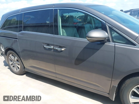 2014 Honda Odyssey Touring with VIN 5FNRL5H99EB075979, listed as a IAAI auction lot 42520154 with 99,314 mi miles and . Bid and sale history available at DreamBid. Image 14.