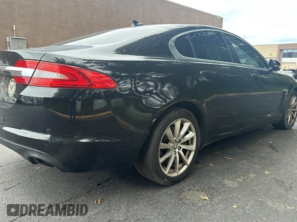 2013 Jaguar XF I4 RWD with VIN SAJWA0ES8DPS97356, listed as a Copart auction lot 74621874 with 123,970 mi miles and Clean Title. Bid and sale history available at carsss.com. Image 4.