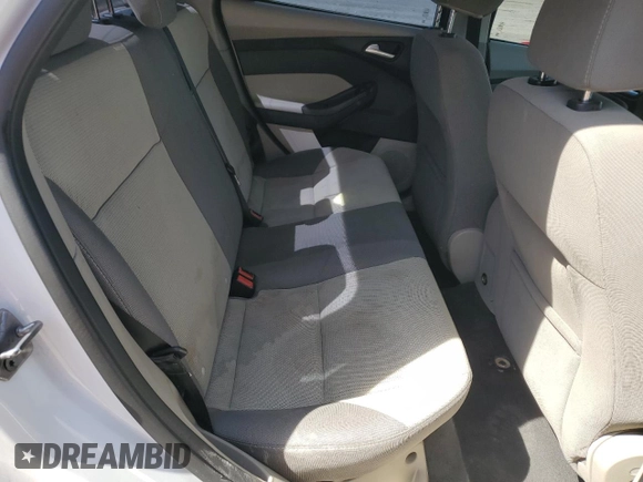2013 Ford Focus SE z VIN 1FADP3F24DL128940, wystawiony jako Copart lot #54798665 z przebiegiem Nie podano mil oraz Tytuł czysty. Historia ofert i sprzedaży dostępna na DreamBid. Obrazek 10.