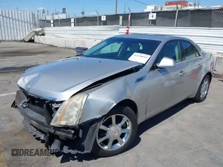 2008 Cadillac CTS RWD with VIN 1G6DM577280111413, listed as a IAAI auction lot 42238643 with 114,706 mi miles and . Bid and sale history available at DreamBid. Image 2.