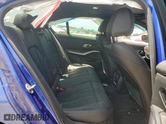 2023 BMW 3 Series 330i with VIN 3MW69FF00P8D04288, listed as a Copart auction lot 57181315 with 35,461 mi miles and Salvage title. Bid and sale history available at DreamBid. Image 10.