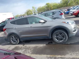 2017 Hyundai Santa Fe 2.4L with VIN 5XYZTDLB9HG440064, listed as a IAAI auction lot 42061524 with 140,365 mi miles and . Bid and sale history available at DreamBid. Image 14.