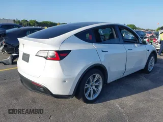 2021 Tesla Model Y Standard Range with VIN 5YJYGDED3MF103650, listed as a IAAI auction lot 41726278 with Not Provided miles and . Bid and sale history available at DreamBid. Image 4.