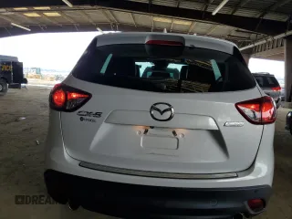 2014 Mazda CX-5 Grand Touring with VIN JM3KE2DY5E0383597, listed as a Copart auction lot 50205545 with 110,052 mi miles and Salvage Title. Bid and sale history available at carsss.com. Image 6.