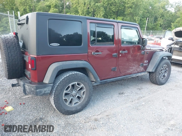 2008 Jeep Wrangler Unlimited X z VIN 1J4GA39128L568988, wystawiony jako IAAI lot #42445403 z przebiegiem 198 032 mil mil oraz . Historia ofert i sprzedaży dostępna na DreamBid. Obrazek 4.