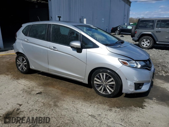 2015 Honda Fit EX-L with VIN 3HGGK5H86FM704890, listed as a Copart auction lot 52186675 with 114,098 mi miles and Salvage Title. Bid and sale history available at DreamBid. Image 4.
