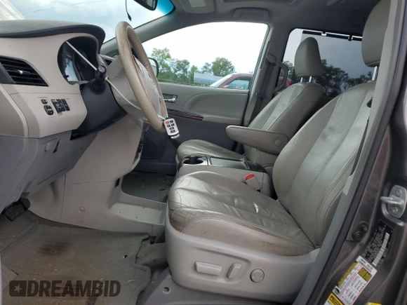 2012 Toyota Sienna XLE AAS with VIN 5TDYK3DC0CS251735, listed as a Copart auction lot 62208805 with 217,504 mi miles and Clean title. Bid and sale history available at DreamBid. Image 7.