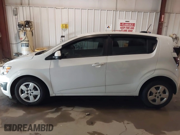 2016 Chevrolet Sonic LS with VIN 1G1JA6SH1G4174680, listed as a IAAI auction lot 41299210 with 90,210 mi miles and . Bid and sale history available at DreamBid. Image 14.