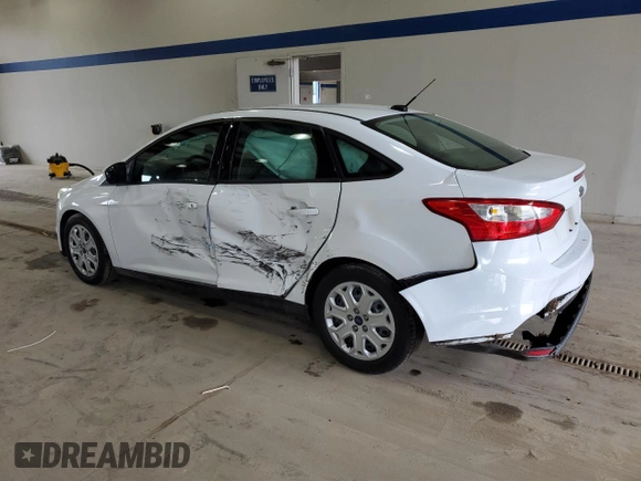 2012 Ford Focus SE with VIN 1FAHP3F20CL451852, listed as a Copart auction lot 60310765 with 150,305 mi miles and Salvage title. Bid and sale history available at DreamBid. Image 2.