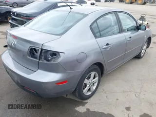 2006 Mazda 3 i with VIN JM1BK12F261420775, listed as a IAAI auction lot 42031576 with 145,530 mi miles. Bid and sale history available at carsss.com. Image 4.