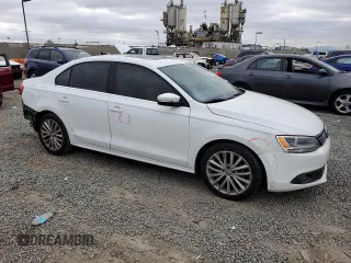2014 Volkswagen Jetta TDI w/Premium/Nav with VIN 3VWLL7AJ0EM332476, listed as a Copart auction lot 50069445 with 153,974 mi miles and Salvage title. Bid and sale history available at DreamBid. Image 4.