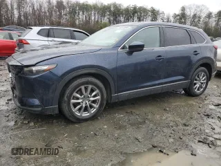 2019 Mazda CX-9 Touring with VIN JM3TCBCY4K0309949, listed as a Copart auction lot 50247995 with 99,564 mi miles and Salvage title. Bid and sale history available at DreamBid. Image 1.