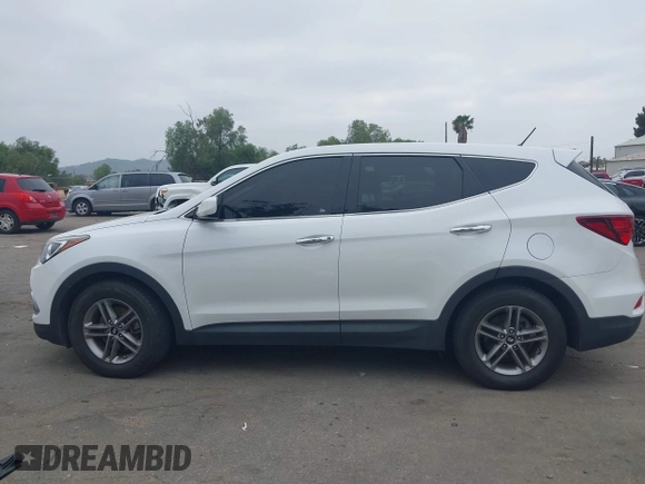 2018 Hyundai Santa Fe Sport 2.4L with VIN 5XYZT3LB0JG562814, listed as a IAAI auction lot 42047560 with 113,543 mi miles. Bid and sale history available at carsss.com. Image 14.