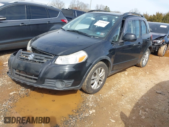 2013 Suzuki SX4 Crossover z VIN JS2YB5A35D6100607, wystawiony jako IAAI lot #41605648 z przebiegiem 64 685 mil mil oraz . Historia ofert i sprzedaży dostępna na DreamBid. Obrazek 17.