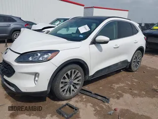 2020 Ford Escape Titanium Hybrid with VIN 1FMCU0DZ9LUA54867, listed as a IAAI auction lot 42268245 with 68,974 mi miles and . Bid and sale history available at DreamBid. Image 17.