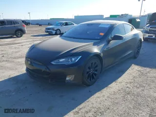 2016 Tesla Model S 90D with VIN 5YJSA1E24GF129862, listed as a IAAI auction lot 41343452 with 1 mi miles. Bid and sale history available at carsss.com. Image 2.