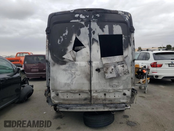 2024 Ford Transit Cargo with VIN 1FTBR1C86RKA98779, listed as a Copart auction lot 70473944 with 35 mi miles and Salvage Title. Bid and sale history available at DreamBid. Image 6.