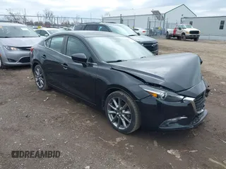 2018 Mazda 3 Grand Touring z VIN 3MZBN1W32JM172589, wystawiony jako IAAI lot #41822389 z przebiegiem 86 048 mil mil oraz . Historia ofert i sprzedaży dostępna na DreamBid. Obrazek 1.