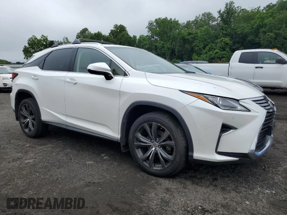 2017 Lexus RX 350 z VIN JTJBZMCA4H2023871, wystawiony jako Copart lot #61444215 z przebiegiem 192 434 mil mil oraz Szkoda całkowita • Salvage title. Historia ofert i sprzedaży dostępna na DreamBid. Obrazek 4.