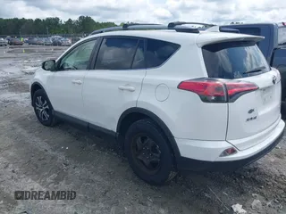 2017 Toyota RAV4 LE with VIN JTMBFREV8HJ700774, listed as a IAAI auction lot 42439345 with 96,907 mi miles and . Bid and sale history available at DreamBid. Image 3.