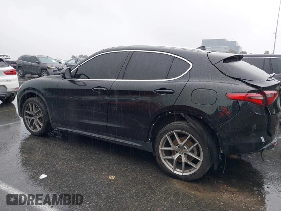 2018 Alfa Romeo Stelvio z VIN ZASFAKANXJ7C23921, wystawiony jako IAAI lot #38783836 z przebiegiem 93 482 mil mil oraz . Historia ofert i sprzedaży dostępna na DreamBid. Obrazek 14.