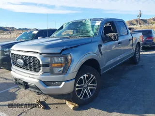 2023 Ford F-150 XL with VIN 1FTFW1E55PKD57059, listed as a IAAI auction lot 41625898 with 49,882 mi miles. Bid and sale history available at carsss.com. Image 2.