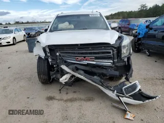 2015 GMC Yukon SLE with VIN 1GKS2AKCXFR744083, listed as a Copart auction lot 82003234 with 150,926 mi miles and Salvage Title. Bid and sale history available at carsss.com. Image 5.