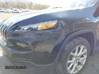 2014 Jeep Cherokee Sport with VIN 1C4PJLAB4EW110051, listed as a IAAI auction lot 41961698 with 153,570 mi miles and . Bid and sale history available at DreamBid. Image 17.