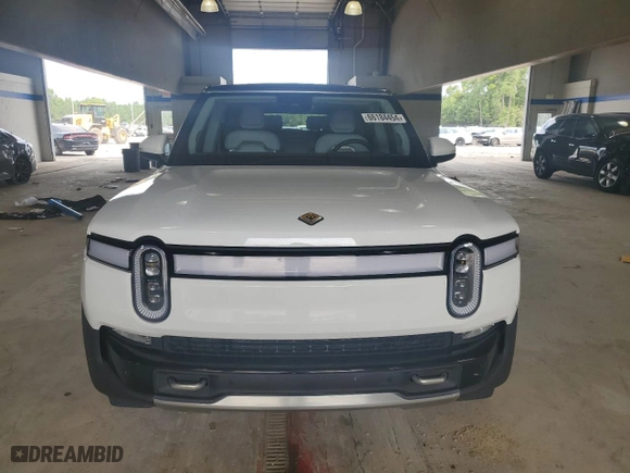 2023 Rivian R1S Adventure with VIN 7PDSGABAXPN021962, listed as a Copart auction lot 66184454 with 0 mi miles and Salvage Title. Bid and sale history available at carsss.com. Image 5.