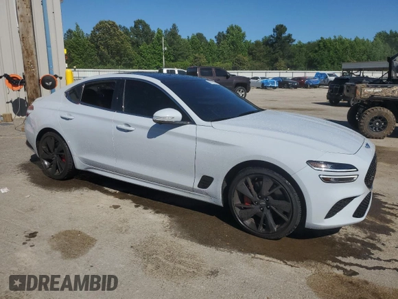 2022 Genesis G70 3.3T with VIN KMTG54TE8NU085587, listed as a Copart auction lot 57897535 with 23,785 mi miles and Salvage title. Bid and sale history available at DreamBid. Image 4.