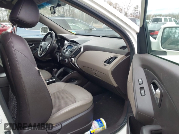 2013 Hyundai Tucson GLS with VIN KM8JU3AC5DU693550, listed as a IAAI auction lot 41919615 with 202,517 mi miles. Bid and sale history available at carsss.com. Image 5.