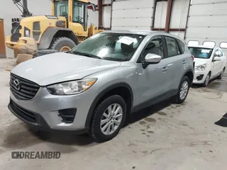 2016 Mazda CX-5 Sport with VIN JM3KE2BY2G0718434, listed as a IAAI auction lot 41961364 with 145,748 mi miles. Bid and sale history available at carsss.com. Image 17.