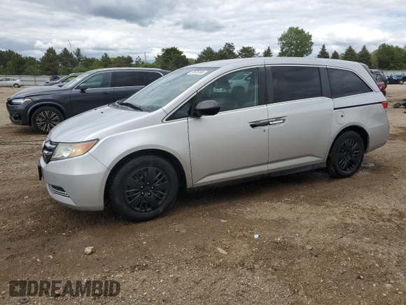2014 Honda Odyssey LX z VIN 5FNRL5H21EB106600, wystawiony jako Copart lot #57875765 z przebiegiem 122 159 mil mil oraz Szkoda całkowita • Salvage title. Historia ofert i sprzedaży dostępna na DreamBid. Obrazek 1.