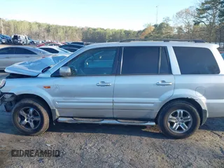 2006 Honda Pilot EX-L with VIN 2HKYF18776H553104, listed as a IAAI auction lot 41878219 with 265,894 mi miles and . Bid and sale history available at DreamBid. Image 13.