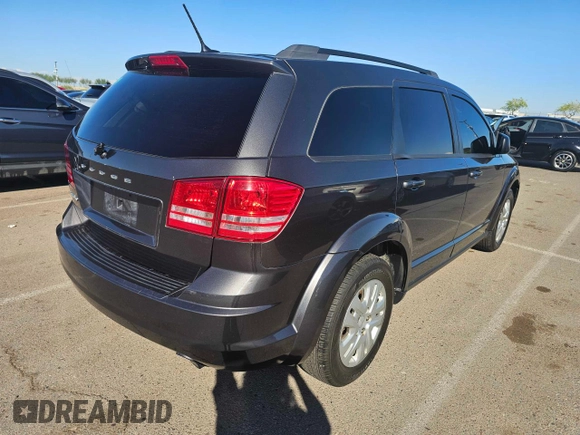 2016 Dodge Journey SE with VIN 3C4PDCAB4GT230593, listed as a Copart auction lot 85387974 with 125,863 mi miles and Clean Title. Bid and sale history available at DreamBid. Image 4.