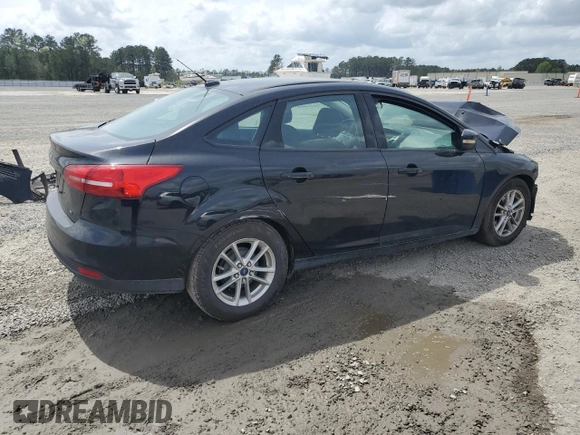 2016 Ford Focus SE with VIN 1FADP3F21GL248456, listed as a Copart auction lot 51583335 with 134,313 mi miles and Salvage title. Bid and sale history available at DreamBid. Image 3.