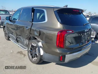2023 Kia Telluride S with VIN 5XYP6DGC2PG387093, listed as a IAAI auction lot 42299026 with 12,895 mi miles and . Bid and sale history available at DreamBid. Image 3.