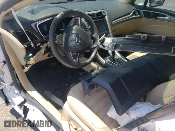 2015 Ford Fusion SE Hybrid z VIN 3FA6P0LU8FR105615, wystawiony jako Copart lot #61451155 z przebiegiem 106 778 mil mil oraz Szkoda całkowita • Salvage title. Historia ofert i sprzedaży dostępna na DreamBid. Obrazek 8.