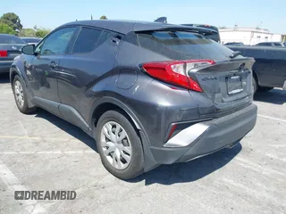 2021 Toyota C-HR LE with VIN JTNKHMBX0M1126776, listed as a IAAI auction lot 41955661 with 81,272 mi miles. Bid and sale history available at carsss.com. Image 3.