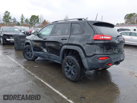 2016 Jeep Cherokee Trailhawk with VIN 1C4PJMBS5GW304062, listed as a IAAI auction lot 41756813 with 112,671 mi miles. Bid and sale history available at carsss.com. Image 3.