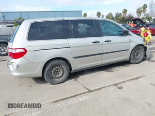 2005 Honda Odyssey LX with VIN 5FNRL38245B024753, listed as a IAAI auction lot 41839673 with 292,563 mi miles. Bid and sale history available at carsss.com. Image 4.