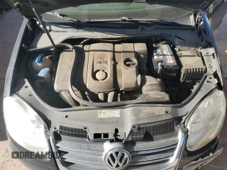 2010 Volkswagen Jetta S with VIN 3VWJZ7AJ7AM051940, listed as a Copart auction lot 54792105 with 159,460 mi miles and Salvage title. Bid and sale history available at DreamBid. Image 11.