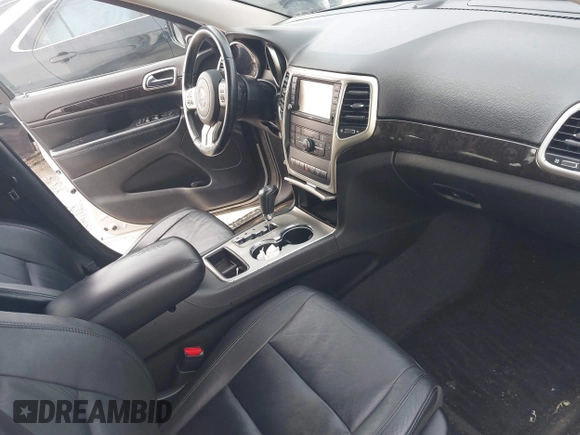 2012 Jeep Grand Cherokee Laredo with VIN 1C4RJFAG7CC189381, listed as a IAAI auction lot 41429085 with 137,238 mi miles. Bid and sale history available at carsss.com. Image 5.