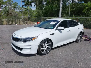 2018 Kia Optima LX z VIN 5XXGT4L39JG272694, wystawiony jako IAAI lot #42155363 z przebiegiem 115 417 mil mil oraz . Historia ofert i sprzedaży dostępna na DreamBid. Obrazek 2.