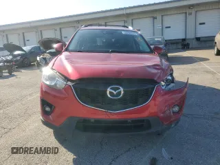 2014 Mazda CX-5 Grand Touring with VIN JM3KE4DY9E0419111, listed as a Copart auction lot 52250315 with 130,003 mi miles and Salvage Title. Bid and sale history available at DreamBid. Image 5.