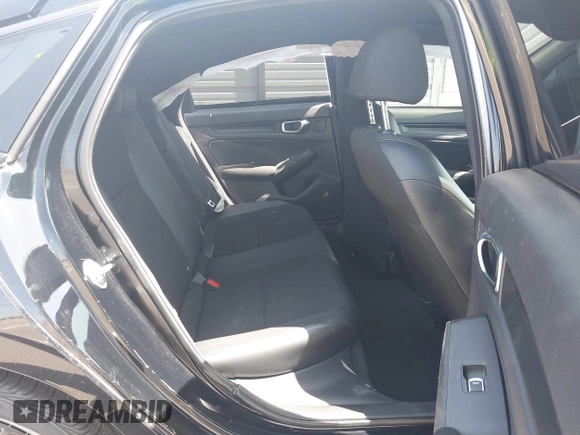 2023 Honda Civic Sport with VIN 19XFL2H84PE001354, listed as a IAAI auction lot 42053691 with 34,127 mi miles and . Bid and sale history available at DreamBid. Image 8.