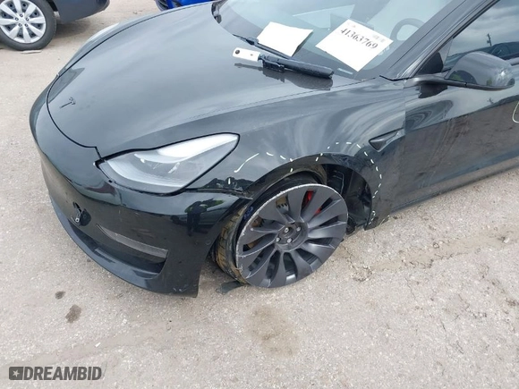 2021 Tesla Model 3 Performance with VIN 5YJ3E1EC0MF925439, listed as a IAAI auction lot 41363769 with 60,503 mi miles. Bid and sale history available at carsss.com. Image 6.